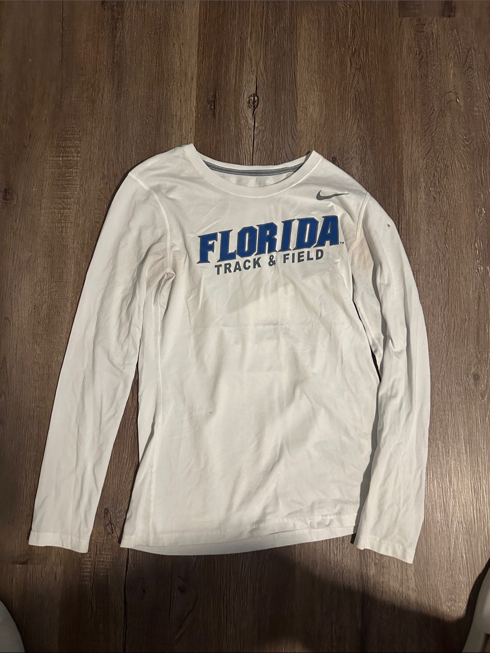Nike White Long Sleeve 'Florida Track & Field' Top with Blue Logo